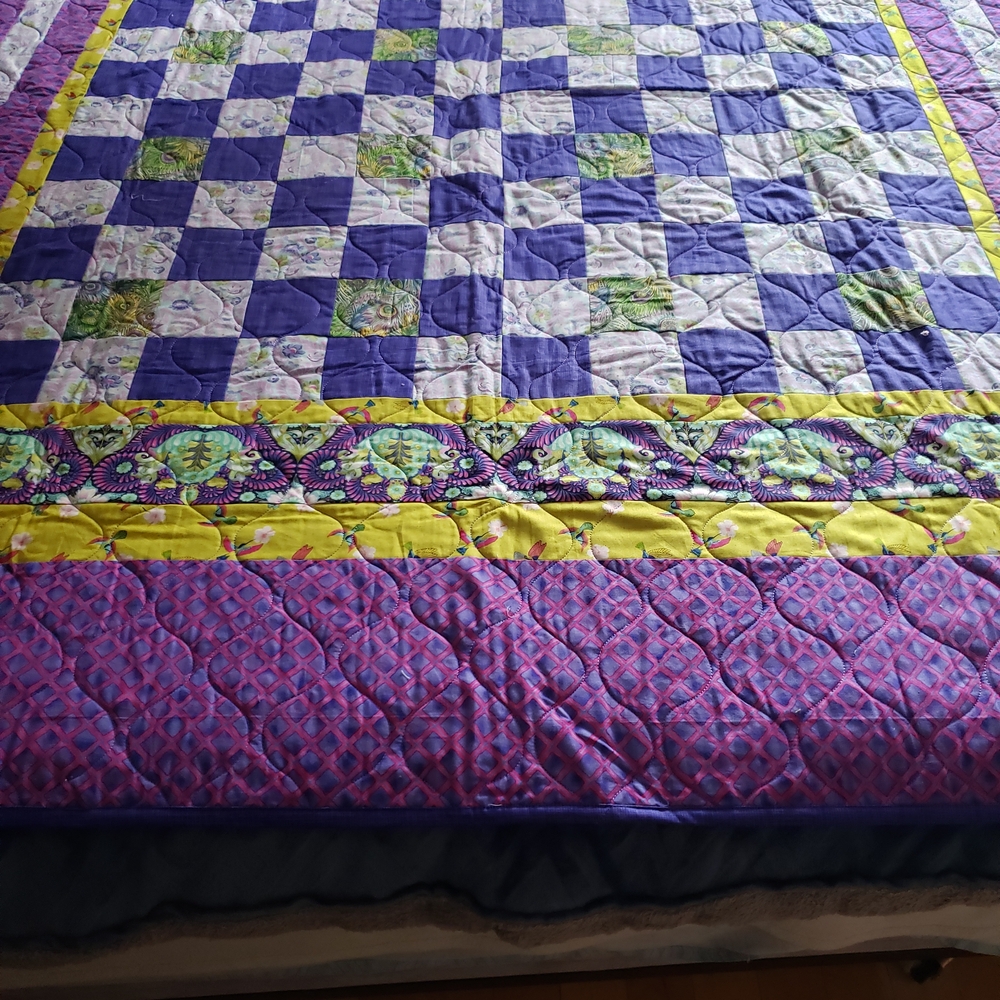 Elegant Purple and Yellow Patchwork Quilt